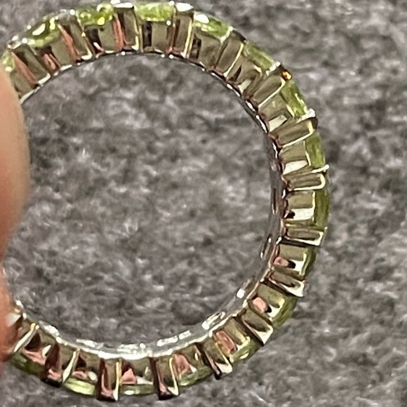 925 Sterling silver eternity ring band, possibly peridot.